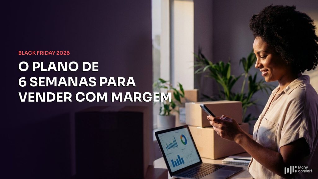 Empreendedora de e-commerce consulta o painel de vendas no notebook enquanto segura o celular em um pequeno centro de distribuição com caixas empilhadas